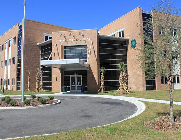 The exterior of the main entrance to the Health Sciences Complex where the Student Health Center is located.